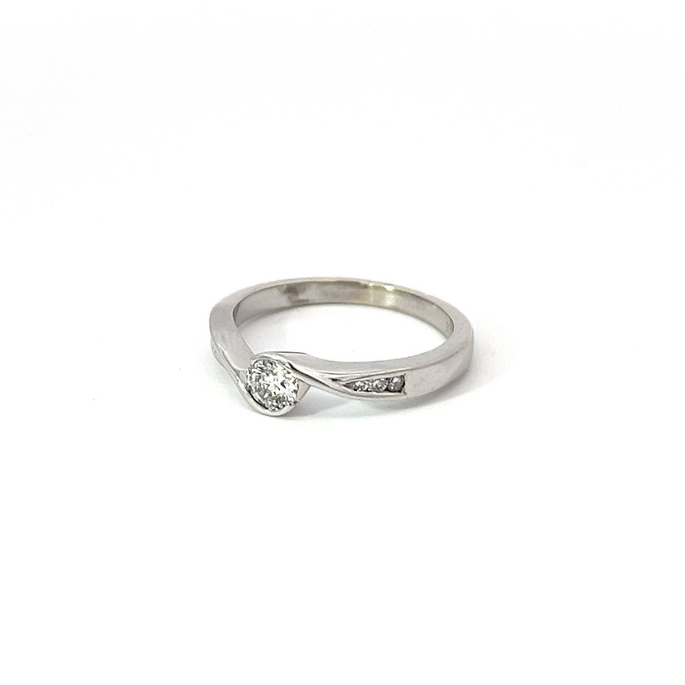 Cross Over Diamond Solitaire Ring in White Gold