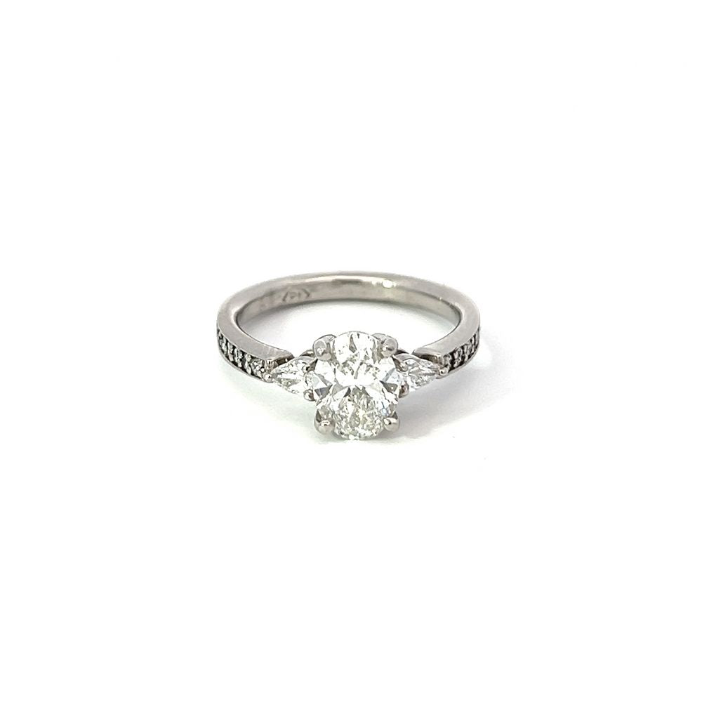 1.55tcw Oval and Pear Diamond Three Stone Ring in Platinum