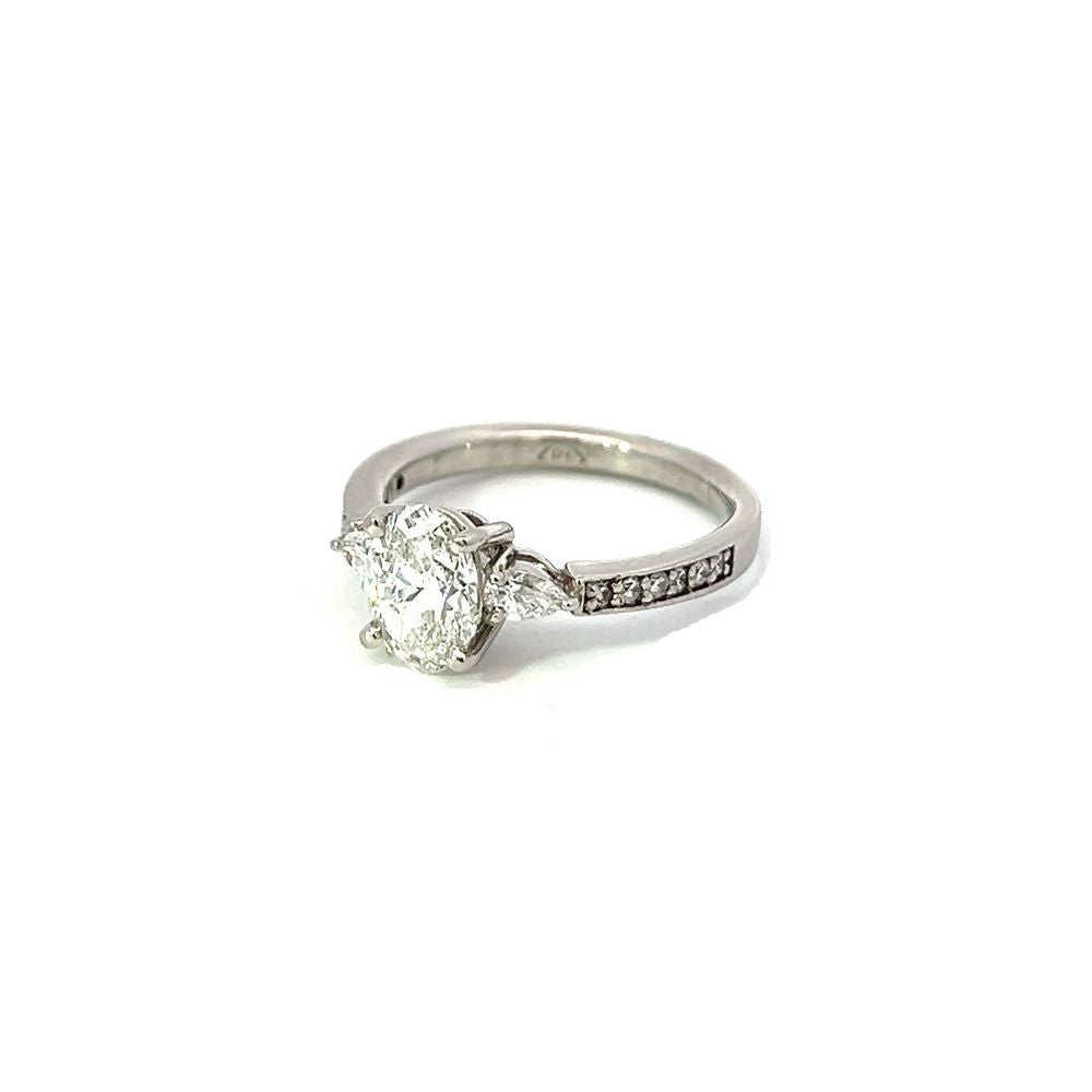 1.55tcw Oval and Pear Diamond Three Stone Ring in Platinum