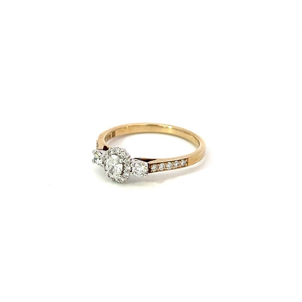 Oval Halo Three Stone Diamond Ring in White & Yellow Gold