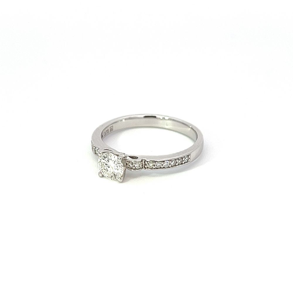 Diamond Solitaire in Solid Bow Setting & Diamond Channel Band