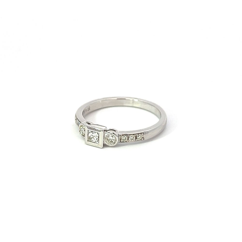 Princess & Round Brilliant Rubover Diamond Ring in White Gold