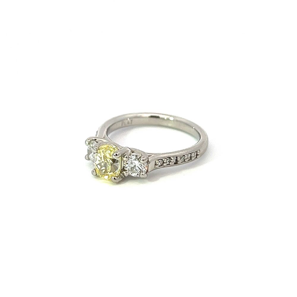 Yellow and Colourless Diamond Three Stone Platinum Ring