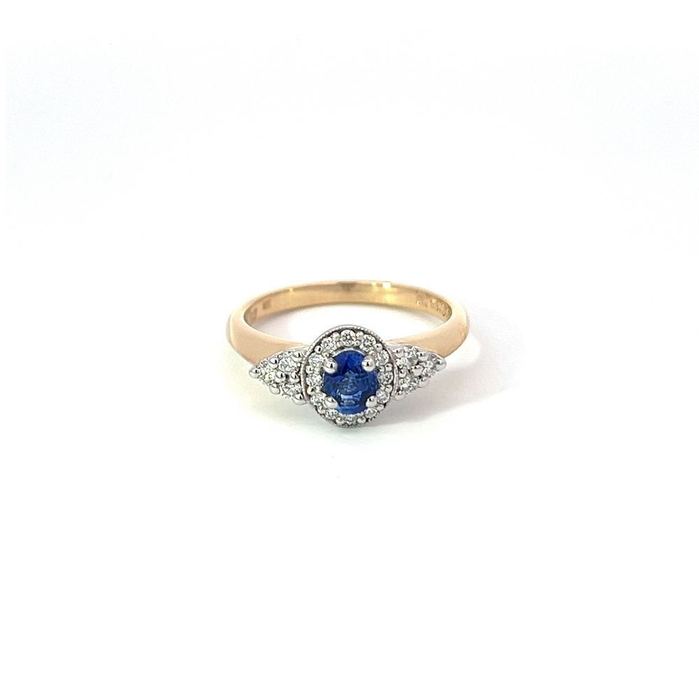 0.48ct Ceylon Sapphire & Diamond Halo Ring In White Gold