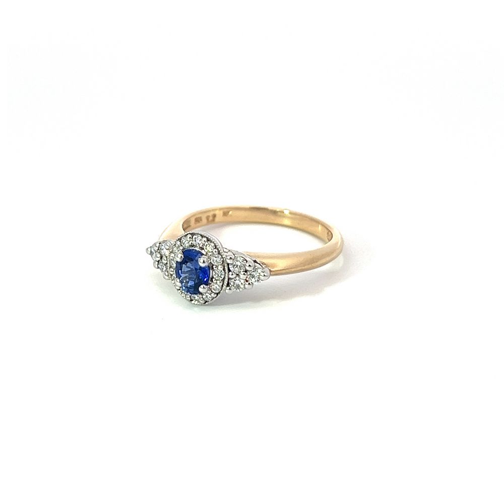 0.48ct Ceylon Sapphire & Diamond Halo Ring In White Gold