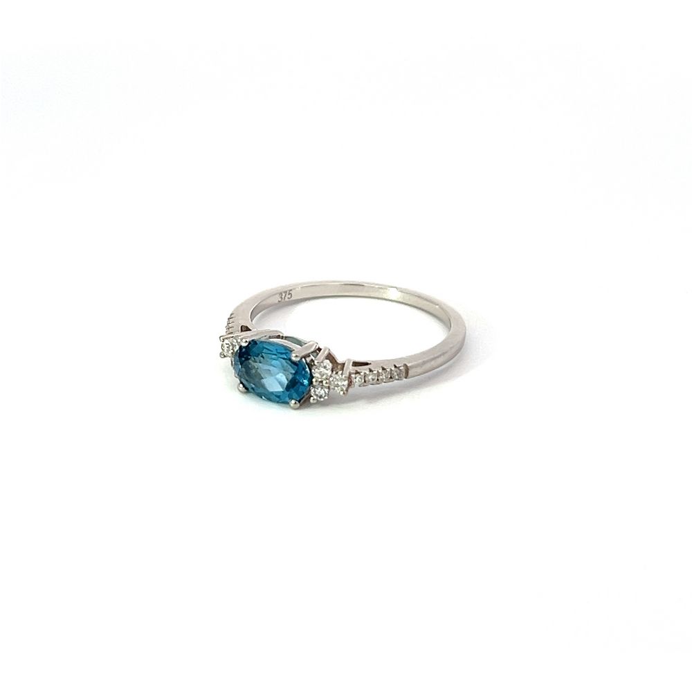 Oval London Blue Topaz Solitaire & Diamond Ring