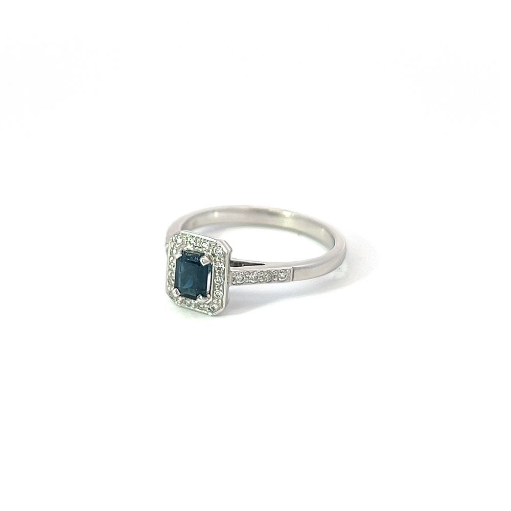 Emerald Cut Sapphire & Diamond Halo Ring In White Gold