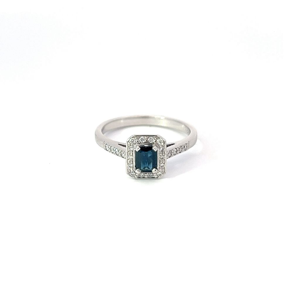 Emerald Cut Sapphire & Diamond Halo Ring In White Gold