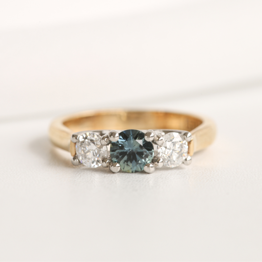 Teal Sapphire and Diamond Three Stone Ring in Gold