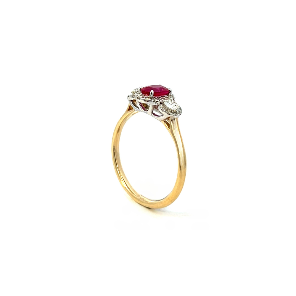 Oval Ruby and Diamond Halo Ring set in Two Tone 9ct Gold