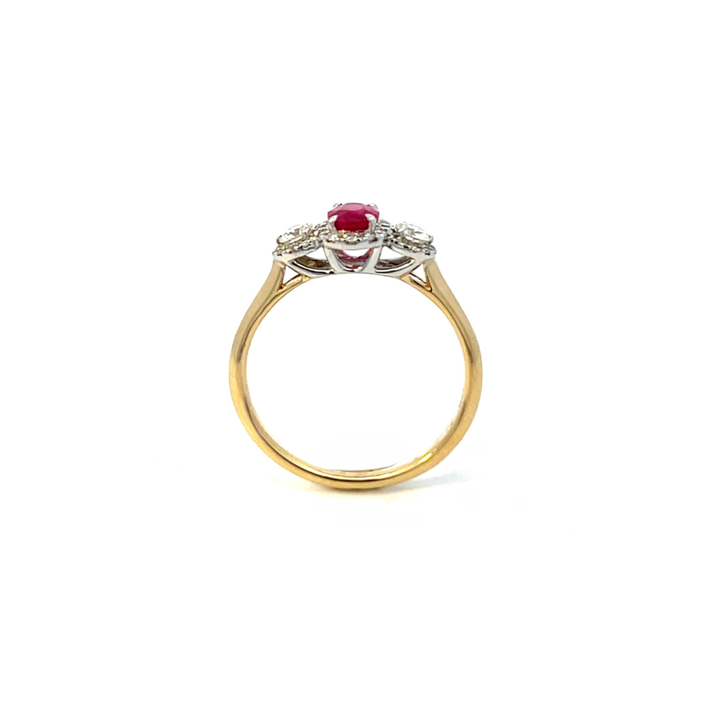 Oval Ruby and Diamond Halo Ring set in Two Tone 9ct Gold