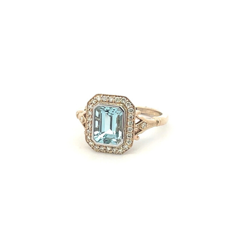 1.36ct Aquamarine & Diamond Halo Ring in 9ct Gold