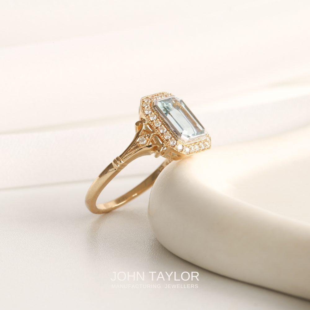 1.36ct Aquamarine & Diamond Halo Ring in 9ct Gold