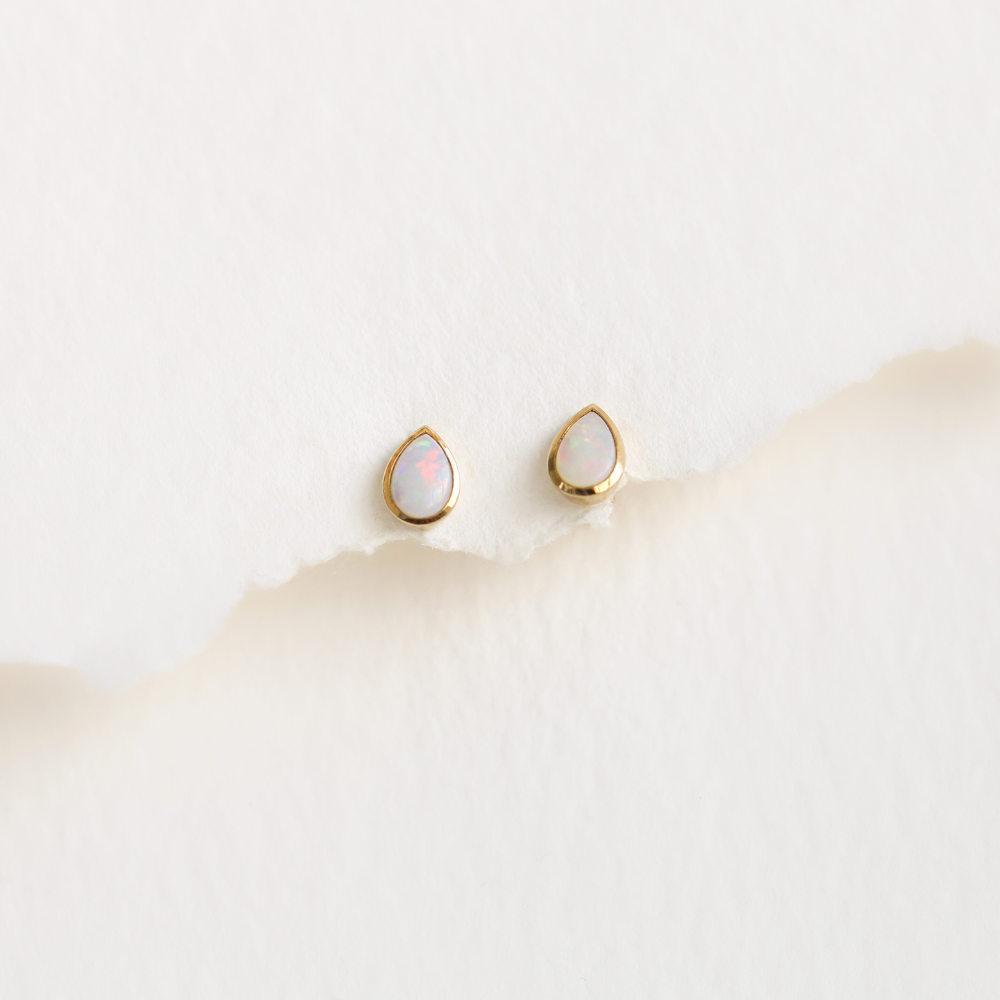 White Opal Stud Earrings in 9ct Gold