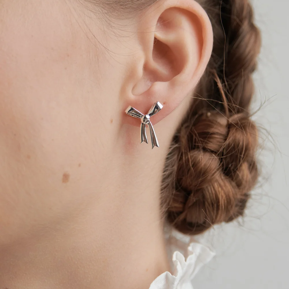 Karen Walker Silver Bow Studs