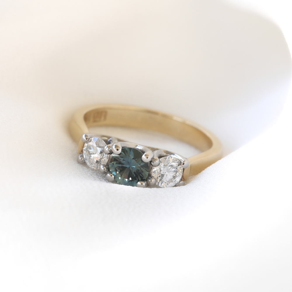 Teal Sapphire and Diamond Three Stone Ring in Gold