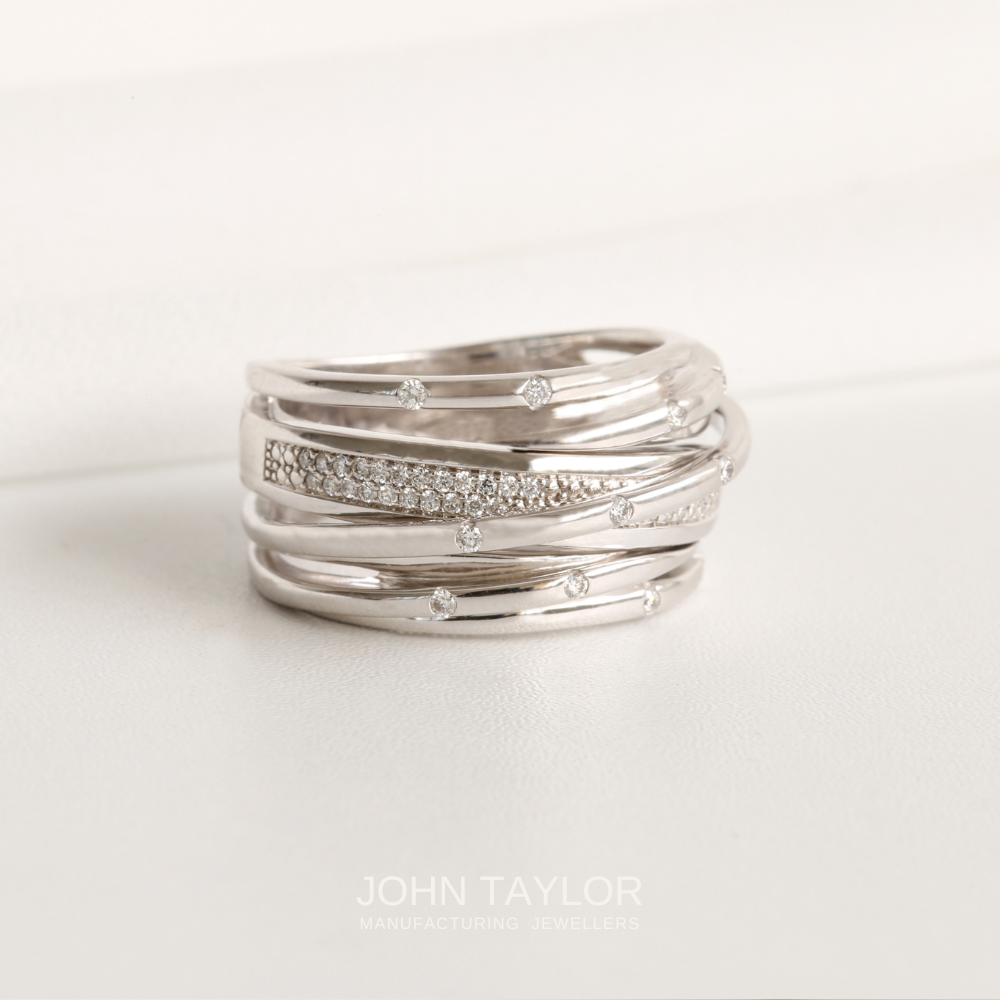 Wide Multi Diamond Crossover Band in White Gold