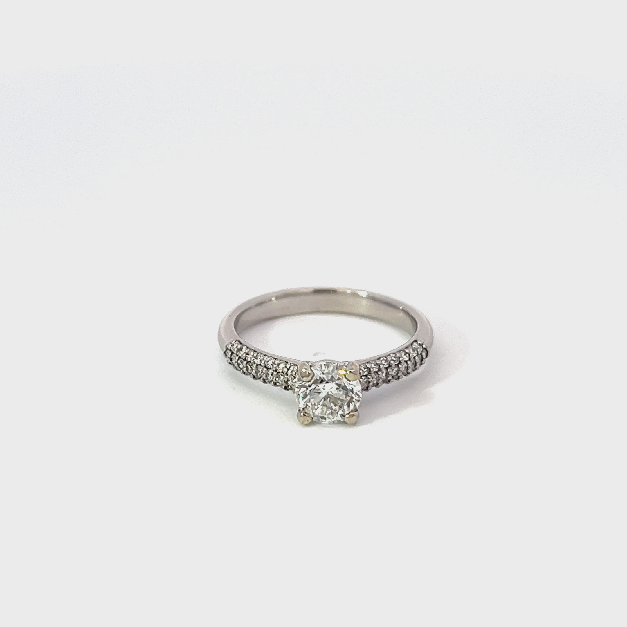 Solitaire Diamond Ring with Pavé Diamond Shoulders